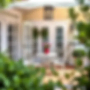 Elegant Patio with Bistro Dining Ensemble Elegant patio adorned with a French bistro dining ensemble