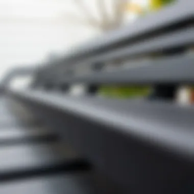 Close-up view of black outdoor bench materials showcasing texture and durability