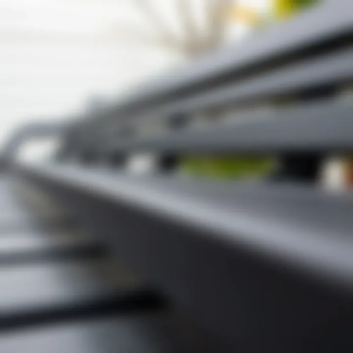 Close-up view of black outdoor bench materials showcasing texture and durability