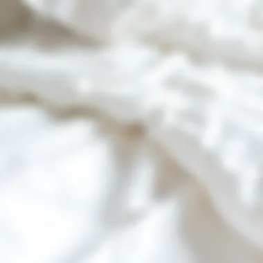 Luxurious Fabric Texture of White Duvet Cover Close-up view of luxurious fabric texture of a white duvet cover
