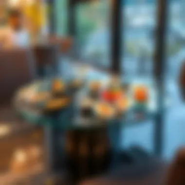 A modern glass lazy Susan used in an upscale dining setting with delicious appetizers