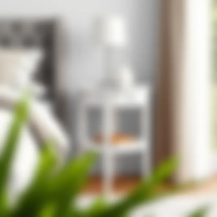 Small White End Table in Bedroom Setting Stylish small white end table placed beside a bed