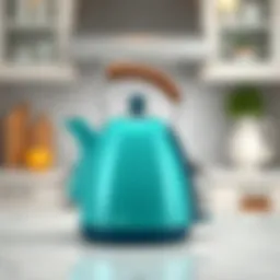 A modern teal kettle on a countertop